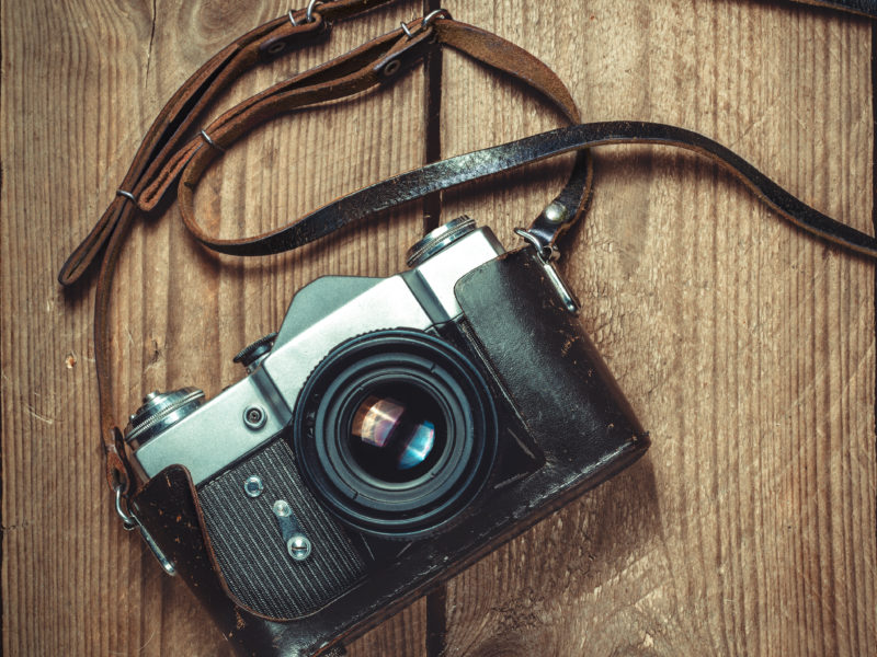 Vintage Camera On Wooden Background